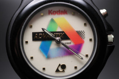 Watch with a colorful logo on the dial, featuring the Kodak brand.